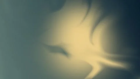 Seamless loop background with dark teal and flowing yellow light shapes. 4K. Stock Footage 300840463