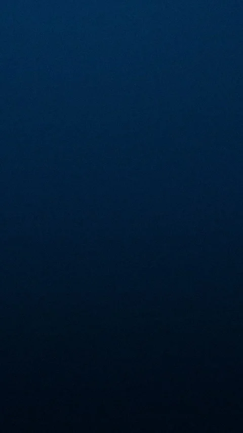 Seamless loop background with deep blue gradient and subtle grain texture. 4K. Stock Footage 309701340