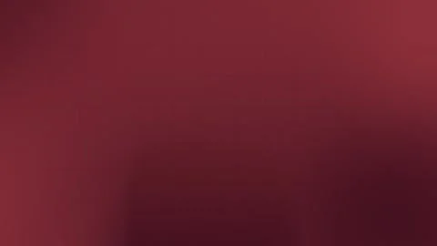 Seamless loop background featuring a deep red gradient with subtle grid lines. Stock Footage 309700532