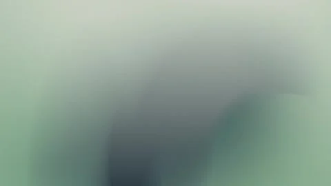 Seamless loop background featuring smooth, blended gradients of green and gray Stock Footage 299664576