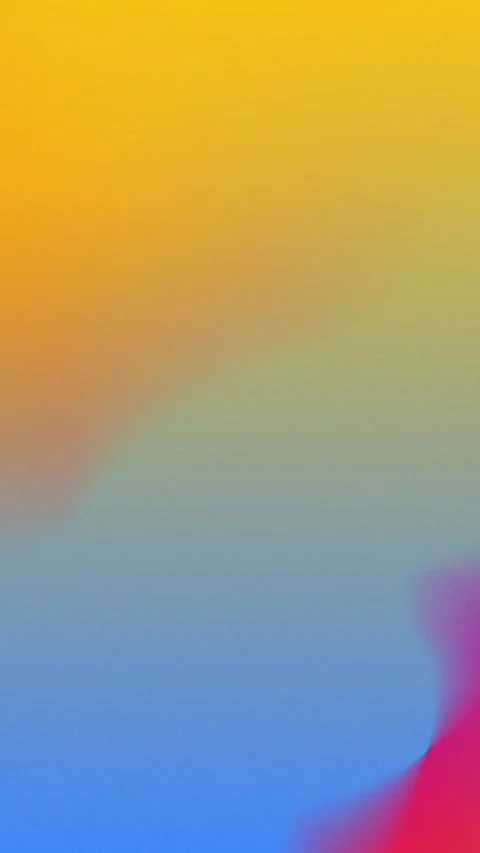 Seamless loop background featuring a smooth gradient of yellow to blue with red 動画素材 309856190