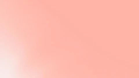Seamless loop background featuring a soft gradient blending from warm peach to Stock Footage 299447699