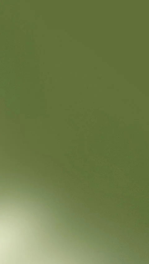 Seamless loop background featuring a soft olive green gradient with smooth Stock Footage 305344801