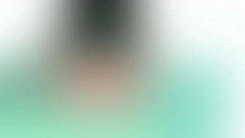 Seamless loop background featuring a soft, green-to-gray gradient blur, with Stockbeeldmateriaal 309855491