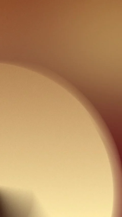 Seamless loop background featuring a soft gradient of warm beige and orange Stock Footage 309855949