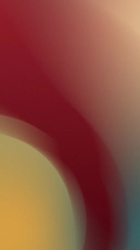 Seamless loop background featuring a soft blend of red, beige, and yellow Stock Footage 309956579
