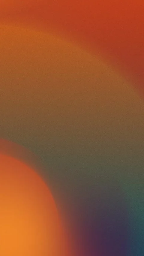 Seamless loop background featuring soft gradient hues of orange, red, and blue. 動画素材 309956584