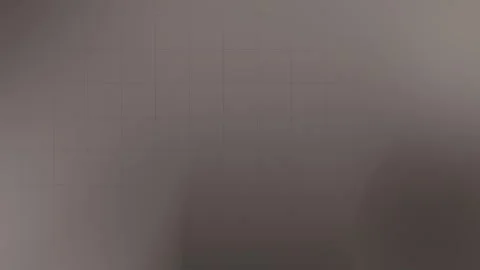 Seamless loop background with a gradient of dark gray and subtle grid lines. Stock Footage 299397163