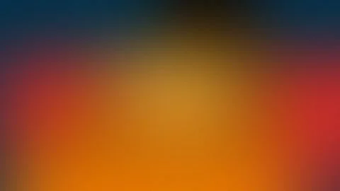 Seamless loop background with a gradient of deep blue, warm orange, and red Stock Footage 300840034