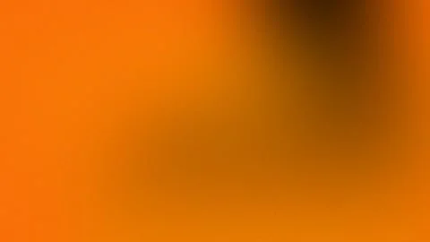 Seamless loop background with gradient orange and brown hues. 4K. Stock Footage 309855578