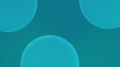 Seamless loop background with large blue gradient spheres on teal. 4K Stockbeeldmateriaal 309701149