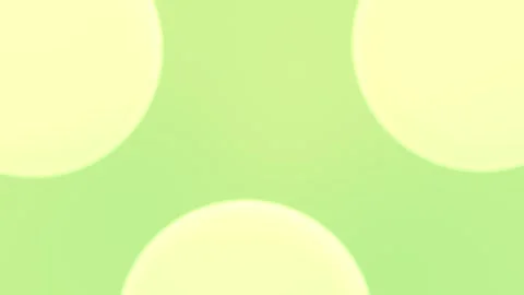 Seamless loop background with large soft circles glowing on a pastel green 動画素材 309855837