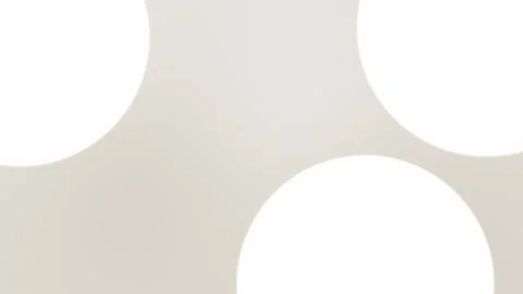 Seamless loop background with large white circles on beige, pink gradient hues. Stockbeeldmateriaal 309855820