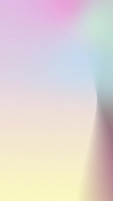 Seamless loop background with pastel gradient hues. Soft pink, yellow, and blue Stock Footage 309956400