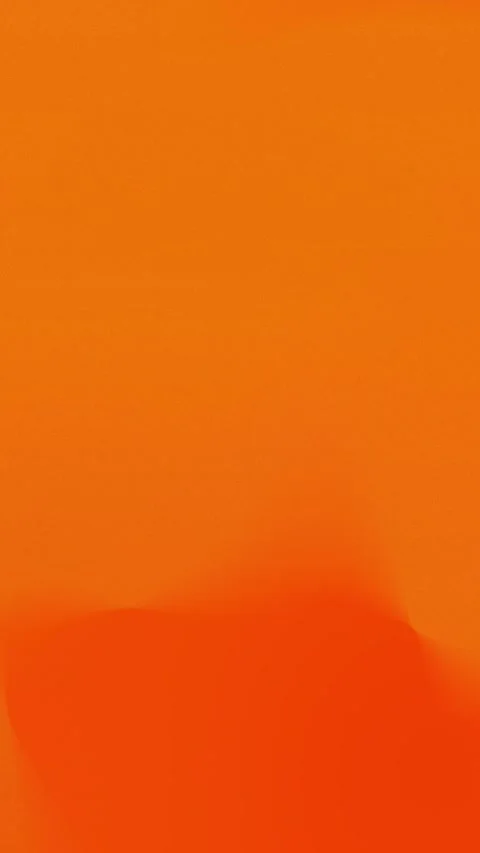 Seamless loop background in shades of orange with smooth, wavy shapes. 4K. Vídeo Stock 309957094