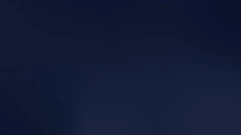 Seamless loop background of smooth black gradient. 4K minimalistic design. 動画素材 309700870