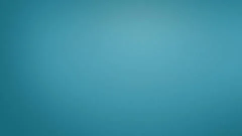 Seamless loop background of smooth blue gradient with subtle grain texture. 4K Видео 309701076