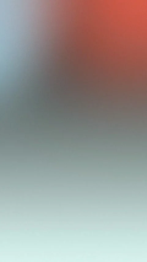 Seamless loop background with a smooth gradient of blue to red hues. 4K Vídeos de archivo 309957058