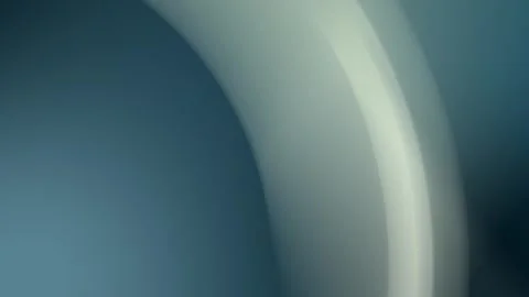 Seamless loop background with smooth gray and blue curves. 4K quality image Stockbeeldmateriaal 309701032