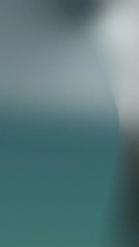 Seamless loop background with smooth teal and gray gradient. 4K Vídeo Stock 309956412