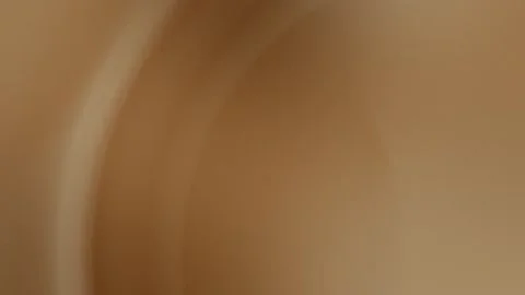 Seamless loop background with soft brown curved gradient shapes. 4K abstract Stock Footage 299397586