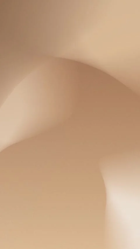 Seamless loop background with soft, flowing beige curves and gradients. 4K. Stock Footage 309957077