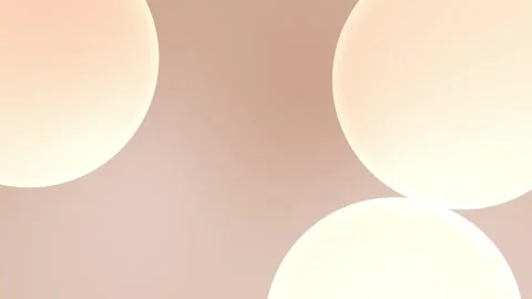 Seamless loop background with soft, glowing cream spheres on a light beige Stock Footage 305344789