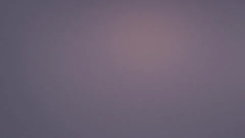 Seamless loop background with a soft gradient from deep purple to pink. 4K. Stockbeeldmateriaal 309855749