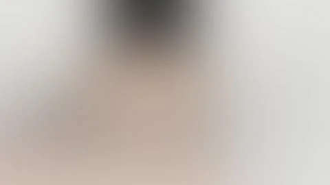 Seamless loop background with soft gradient blur in gray and beige tones. 4K Stockbeeldmateriaal 309955580