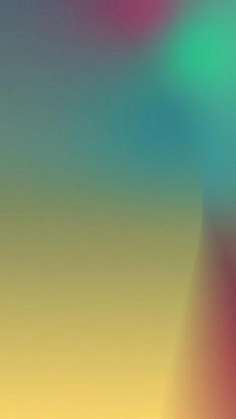 Seamless loop background with a soft gradient blend of teal, magenta, and golden Stock Footage 309956386