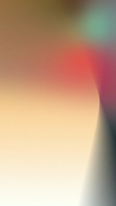 Seamless loop background with soft gradient hues of beige, red, and teal. Curved Stockbeeldmateriaal 309956423