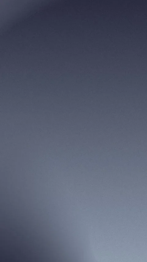 Seamless loop background with soft gray gradient and grain texture in 4K. Vídeo Stock 309701654