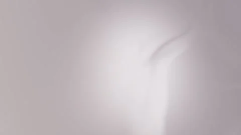 Seamless loop background with soft lavender hues, smooth curves, and subtle Stock Footage 309956721