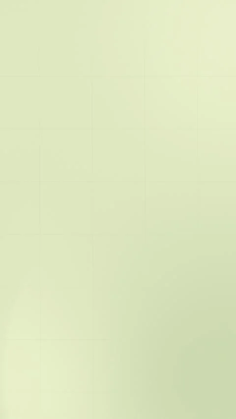 Seamless loop background with a soft pale green hue and subtle grid texture. 4K. Stock Footage 309956879