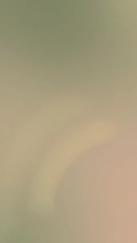 Seamless loop background in soft pastel tones, featuring a blurred gradient of Vídeo Stock 309856134