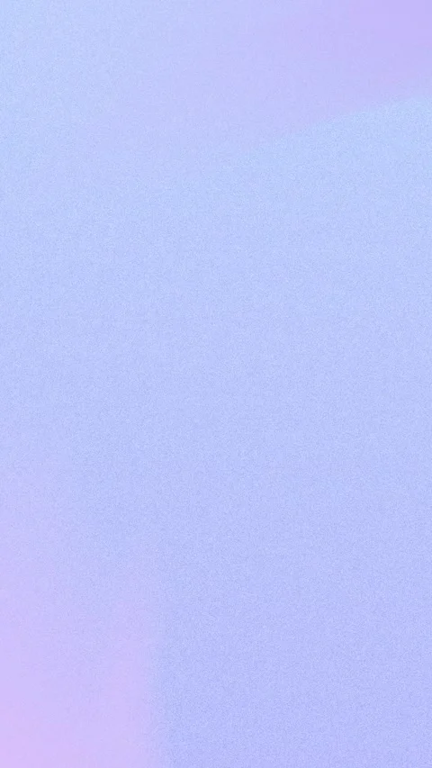 Seamless loop background of soft, pastel grainy purple with hints of pink in 4K. Stock Footage 309956617