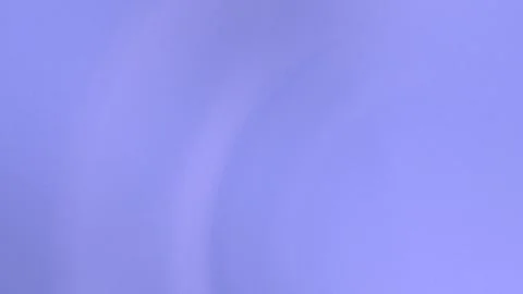 Seamless loop background in soft purple hues with gentle curved lines creating a Stock Footage 299397742
