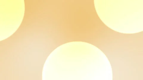 Seamless loop background with soft yellow circles glowing on a warm beige canvas Stock Footage 305344749