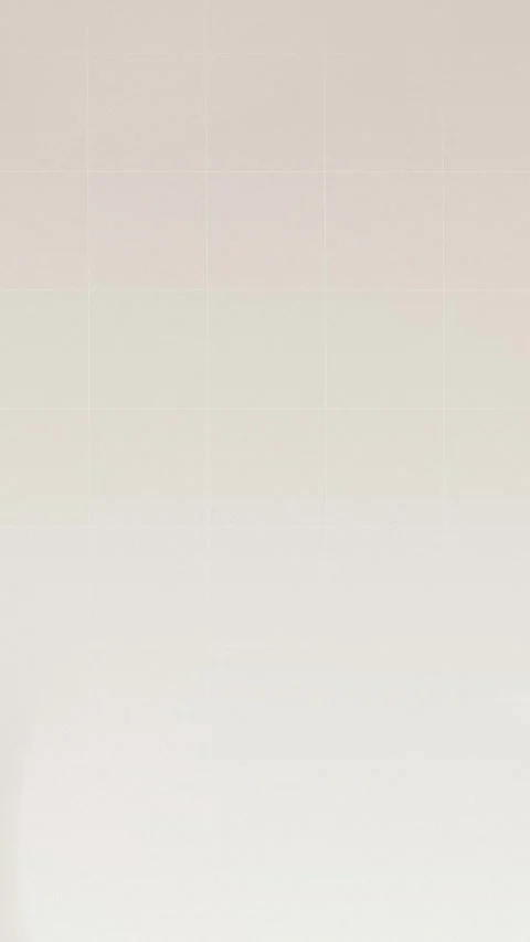 Seamless loop background with subtle beige gradient and fine grid pattern. 4K. Stock Footage 309856103