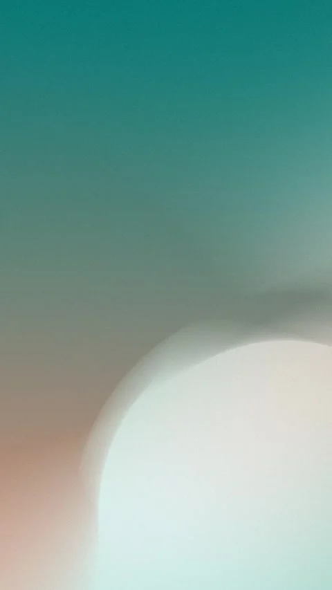 Seamless loop background with a teal to beige gradient and soft blurry curves. Stockbeeldmateriaal 309701556