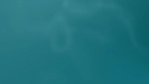 Seamless loop background with teal gradient and subtle soft patterns. 4K. Stock Footage 300840521