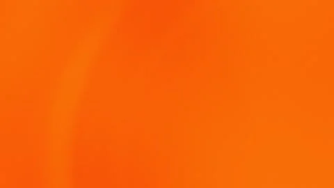 Seamless loop background with vibrant orange and subtle red hues. Smooth, Stock Footage 299397695