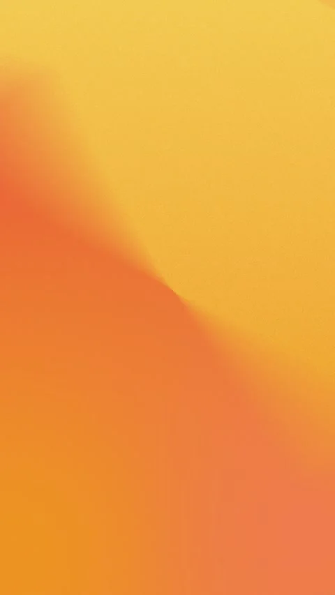 Seamless loop background with a vibrant orange and yellow gradient. Smooth Stock Footage 309956524