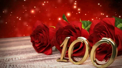Seamless loop birthday background with red roses on wooden desk. hundredth Stock Footage 71841591
