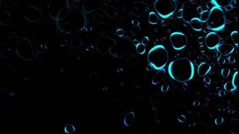 Seamless loop blue water drops glowing on dark black glass surface Stock Footage 348271045