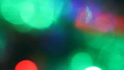 Seamless loop of blurred blinking colorful LED lights Stock Footage 128784126