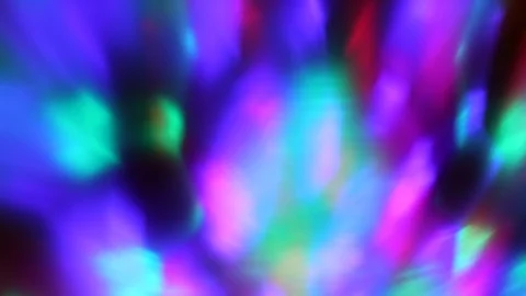 Seamless loop of blurred rotating colorful LED lights Stock Footage 126903903