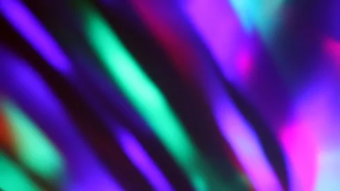 Seamless loop of blurred rotating colorful LED lights and moving hand shadow Stock Footage 127025210