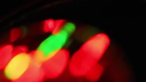 Seamless loop of blurred rotating colorful LED lights Stock Footage 141279261