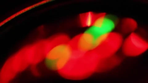 Seamless loop of blurred rotating colorful LED lights Stock Footage 141280013